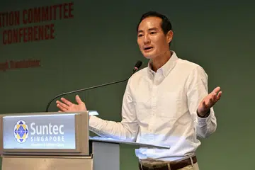 Menteri Negara Kanan (Penerangan dan Pembangunan Digital), Encik Tan Kiat How, berucap di Persidangan Ulang Tahun Ke-10 Jawatankuasa Penterjemahan Nasional (NTC) pada 15 November di Pusat Konvensyen dan Pameran Suntec Singapura.