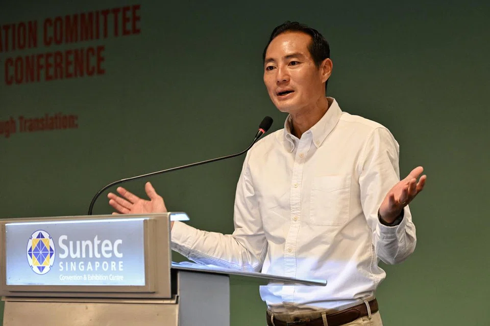 Menteri Negara Kanan (Penerangan dan Pembangunan Digital), Encik Tan Kiat How, berucap di Persidangan Ulang Tahun Ke-10 Jawatankuasa Penterjemahan Nasional (NTC) pada 15 November di Pusat Konvensyen dan Pameran Suntec Singapura.