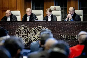 Hakim-hakim Mahkamah Keadilan Antarabangsa (ICJ) semasa keputusan dibuat di The Hague, Belanda, atas permintaan Afrika Selatan bagi langkah kecemasan untuk Gaza pada 26 Januari 2024. 