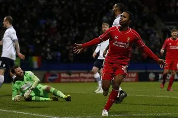 WIRA PASUKAN: Raheem Sterling membantu Liverpool bangkit apabila beliau menjaringkan gol penyamaan lima minit sebelum perlawanan berakhir.