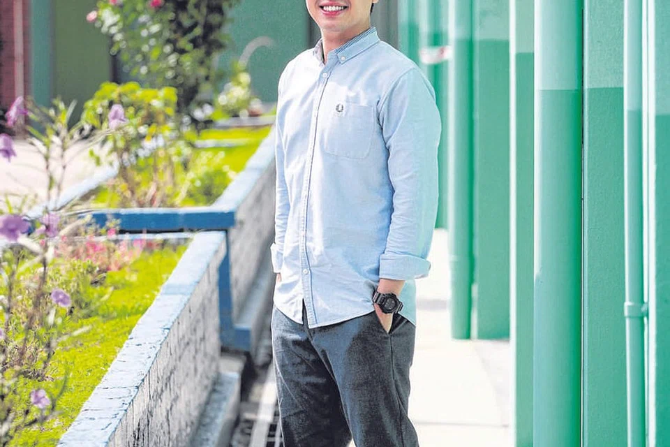 MAHU BANTU BELIA: Encik Muhammad Alif Gadaffi Abdul Hamid memohon menyertai Program Penukaran Kerjaya (CCP) bagi pekerja sosial dan kemudian mendapat tawaran kerja sebagai sekutu kerja sosial di Rumah Kanak-Kanak Pertapis pada Julai tahun lalu. - Foto BH oleh JASON QUAH