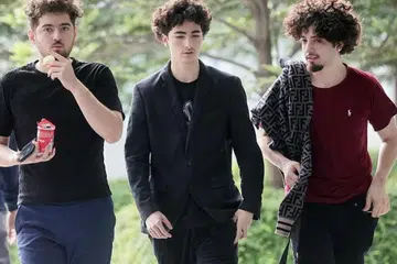 Adik beradik (dari kiri) Albert, Alejandro dan Alexis Martinez-Arizala tiba di Mahkamah Negara pada 5 September 2024. 