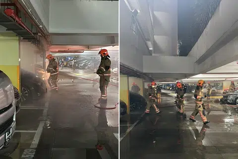Pegawai SCDF kelihatan memadamkan api di tempat kejadian pada tengah malam 4 Mac.