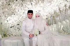 DIDAKWA: Neelofa (kanan) dan suaminya Muhammad Haris Mohd Ismail telah dihadapkan ke mahkamah kerana disyaki melanggar Perintah Kawalan Pergerakan Bersyarat (PKPB). - Foto WEDLOCX.CO