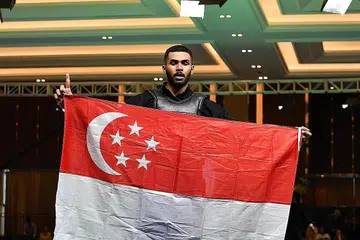 RAJA EMAS: Pesilat Singapura Sheik Farhan Sheik Alau'ddin memenangi pingat emas ketiganya dalam Sukan SEA 2023 pada Rabu. - Foto MAJLIS SUKAN SINGAPURA