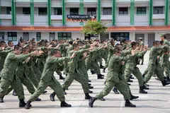 Rekrut Perkhidmatan Negara (NS) menjalani latihan tentera asas di Pulau Tekong.