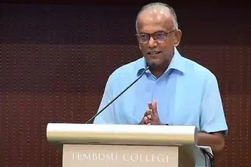 BERI PANDANGAN: Encik K. Shanmugam semasa berucap di sebuah forum anjuran Kolej Tembusu Universiti Nasional Singapura. - Foto FORUM TEMBUSU