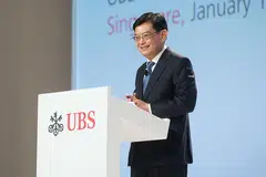UMUMKAN GERAN: Encik Heng Swee Keat berucap di persidangan pengamatan harta UBS di Pusat Konvensyen dan Expo Marina Bay Sands pagi semalam. Beliau turut mengumumkan geran baru yang dipanggil Pasaran Ekuiti Singapura (Gems). - Foto UBS