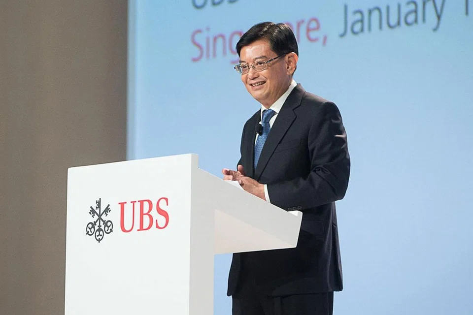 UMUMKAN GERAN: Encik Heng Swee Keat berucap di persidangan pengamatan harta UBS di Pusat Konvensyen dan Expo Marina Bay Sands pagi semalam. Beliau turut mengumumkan geran baru yang dipanggil Pasaran Ekuiti Singapura (Gems). - Foto UBS