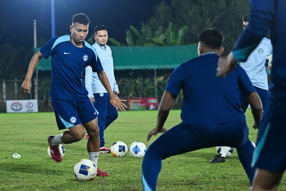 Kapten pasukan bawah 22 tahun Singapura, Amir Syafiz (kiri), menjaringkan gol tunggal pasukannya ketika tewas 1-3 menentang Timor-Leste pada 5 Disember.