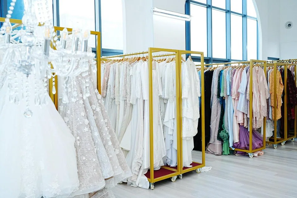 Ratusan pakaian pengantin pelbagai saiz dipamerkan di studio With Love Yumi (WLY) yang terletak di S9 Building 55, Serangoon North Avenue 4.