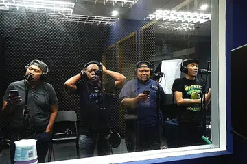 DI BALIK CERMIN STUDIO RAKAMAN: (Dari kiri) Mohammad Nisham Mad, Fadali, Mohamed Fairuzi Mohamed Kassim dan Mohammad Junyadi Akmat dari kumpulan Hulubalang, Alang Ikan Duyung, Kelana Purba dan Raja Laut, merupakan tulang belakang bagi projek rakaman ini. - Foto BOSS PRODUCTION PTE LTD 