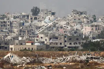 Pemandangan kemusnahan di Gaza Timur yang boleh disaksikan di bahagian Israel di sempadan Israel-Gaza pada 17 Mei.  