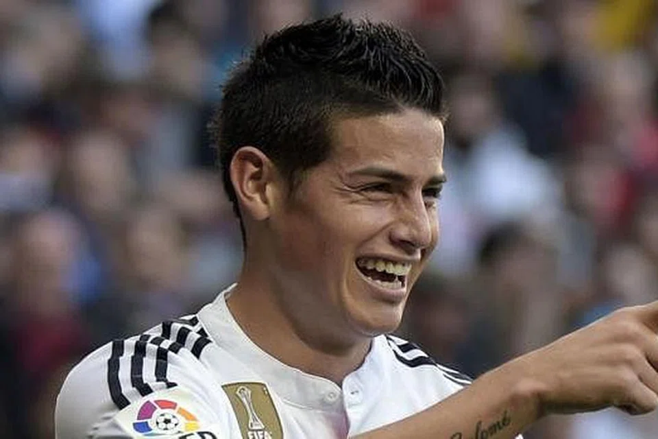 JAMES RODRIGUEZ: Gol penyerang Colombia ini dalam perlawanan menentang Uruguay dipilih jaringan terbaik dalam Piala Dunia di Brazil. - Foto AFP