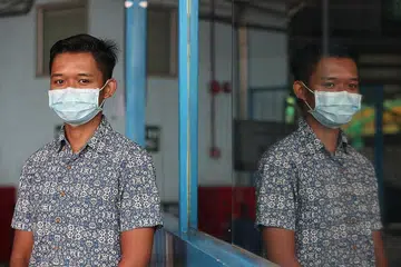 SEDIA BERKHIDMAT: Encik Sufian Supardi antara 1,100 pegawai Home Team yang tampil menawarkan khidmat dalam Pasukan Jaminan dan Sokongan ke Hadapan (FAST), membantu menangani Covid-19 di dormitori pekerja asing. - Foto BH TIMOTHY DAVID