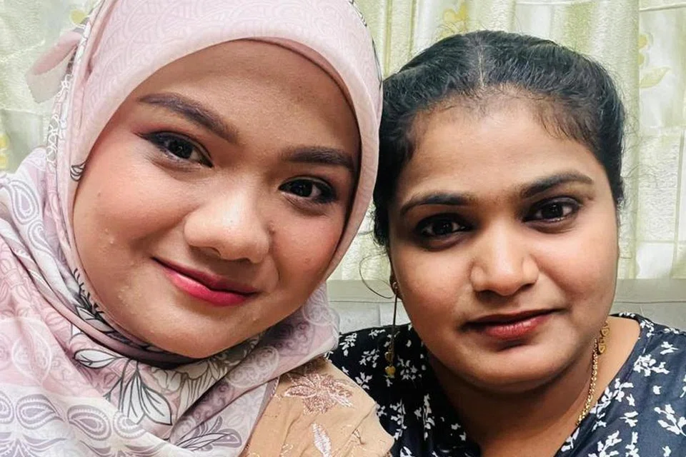 Cik Shaidatul Naqiyah Mohamad Abdullah, 26 tahun (kiri) bersama pengasuh anaknya yang berbangsa India, Cik Banupiriya, 30 tahun.