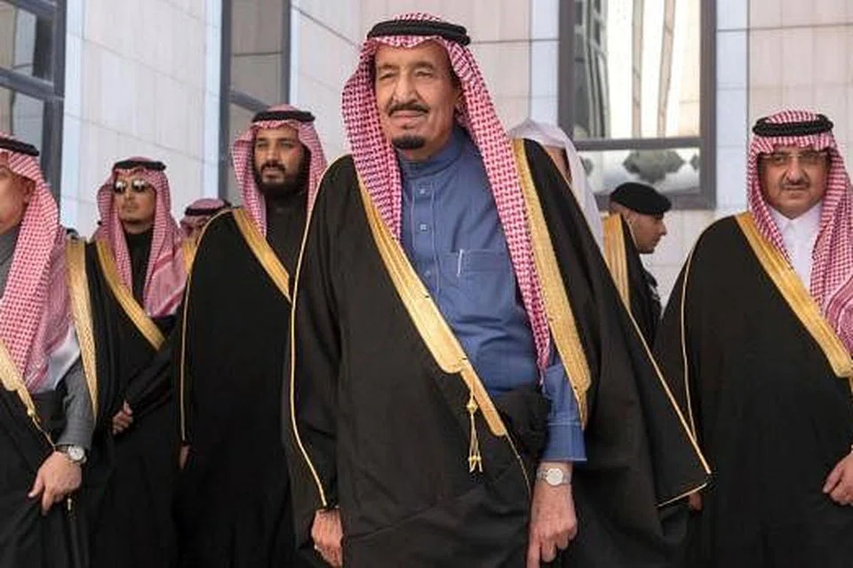 Gambar yang diedar Saudi Press Agency (SPA) pada 23 Disember menunjukkan Raja Salman (tengah) dan para menterinya tiba untuk merasmikan Majlis Syura di Riyadh. Gambar AFP 