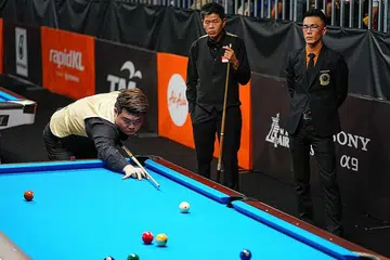 CIPTA SEJARAH: Aloysius Yapp (kiri) dan Toh Lian Han mencipta sejarah dengan menjadi pasangan Singapura pertama mara ke final Piala Dunia Pool. - Foto fail