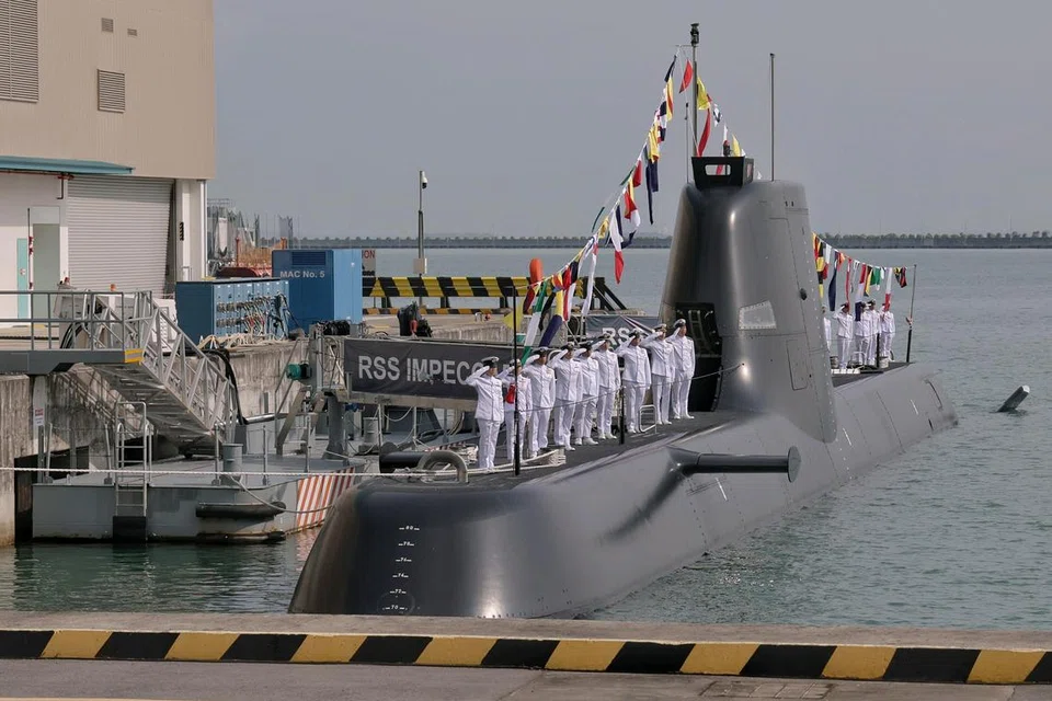 Kru kapal selam berada di ‘RSS Impeccable’ ketika majlis perasmian kapal selam itu di Pangkalan Tentera Laut Changi.