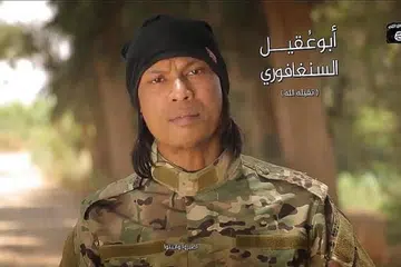 SOKONG ISIS: Warga Singapura, Megat Shahdan Abdul Samad, 42 tahun, dipercayai telah menyertai pasukan bersenjata ISIS dan dilaporkan telah terbunuh di zon konflik di Syria. - Foto VIDEO ISIS