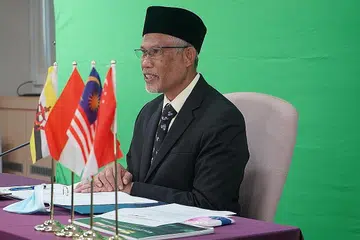 KUKUHKAN PERPADUAN: Encik Masagos di Mesyuarat Tidak Rasmi Mabims ke-19 yang diadakan secara maya semalam. - Foto FACEBOOK MASAGOS ZULKIFLI