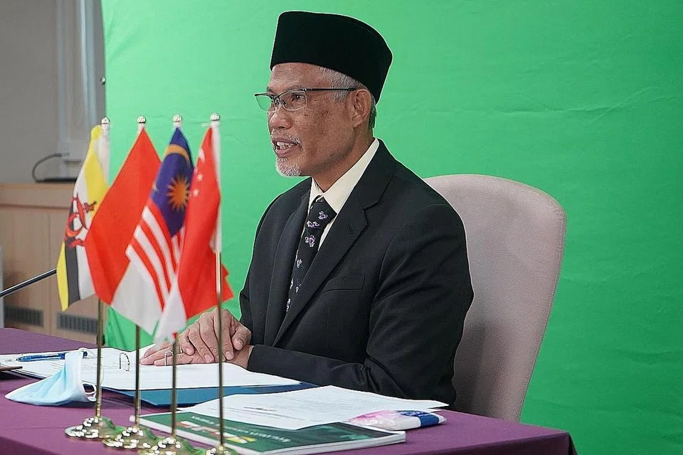 KUKUHKAN PERPADUAN: Encik Masagos di Mesyuarat Tidak Rasmi Mabims ke-19 yang diadakan secara maya semalam. - Foto FACEBOOK MASAGOS ZULKIFLI