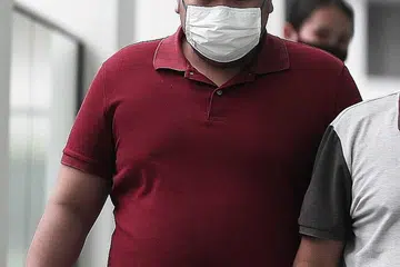 CURI AMBULANS: Haziq Syamim Esa, yang mempunyai sejarah gangguan skizofrenia, mencuri sebuah ambulans dari Balai Bomba Sengkang dan memandunya ke kondominium temanitanya pada Mac lalu. - Foto fail