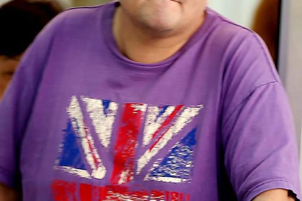 JALANI HUKUMAN: Lim Wee Ming, 46 tahun, telah menumbuk seorang penunggang e-skuter sehingga menyebabkan mata kiri mangsa berdarah. FOTO: FAIL.