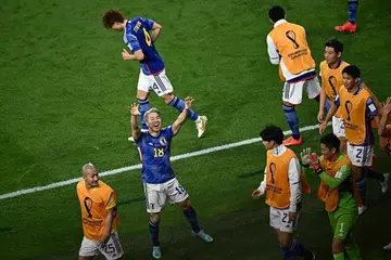 Pemain Jepun meraikan gol kedua pasukan mereka dalam aksi Kumpulan E Piala Dunia 2022 di Stadium Khalifa, Doha. Jepun menewaskan Jerman 2-1. - Foto AFP