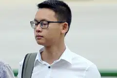 DIDAKWA: Pegawai SAF Tan Baoshu (gambar atas) didakwa dengan perbuatan terburu-buru yang menyebabkan kematian anggota perkhidmatan negara sepenuh masa, Koperal Kelas Pertama Dave Lee Han Xuan, yang mengalami strok haba sejurus selesai menjalani baris pantas pada April lalu. - Foto BH oleh WONG KWAI CHOW