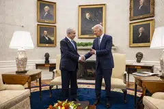 Perdana Menteri Israel Encik Benjamin Netanyahu (kiri) bersalaman dengan Presiden Amerika Syarikat Encik Joe BIden dalam pertemuan di Rumah Putih pada 25 Julai lalu.