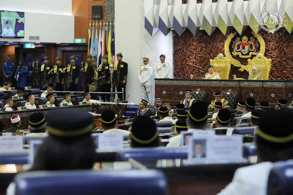 Yang di-Pertuan Agong Malaysia, Sultan Ibrahim Iskandar (tengah), bersama Raja Permaisuri Agong, Raja Zarith Sofiah, pada istiadat pembukaan persidangan Parlimen pertama untuk 2024 pada 26 Februari.