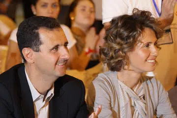 Mantan Presiden Syria, Encik Bashar al-Assad dan isterinya, Cik Asma al-Assad dalam gambar yang dirakam pada 2010.