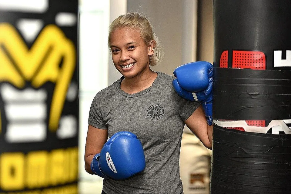 IMPIAN TINGGI: Efasha "The Face" Kamarudin, petinju amatur wanita pertama Singapura untuk memenangi pingat emas dalam kejohanan antarabangsa. - Foto BH oleh KELLY HUI