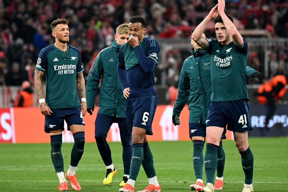 Kekecewaan jelas nampak pada wajah pemain Arsenal selepas mereka disingkirkan daripada kejohanan Liga Juara-Juara.