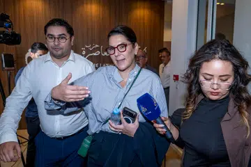 Cik Fatima Ezzahra El Mansouri (tengah), pemimpin Parti Keaslian dan Kemodenan (PAM), meninggalkan mesyuarat Majlis Nasional parti itu di Rabat, Maghribi, pada 29 September 2026. Beliau dilantik Raja Mohammed VI sebagai Perdana Menteri wanita pertama dalam sejarah Maghribi dan ditugaskan membentuk kerajaan baharu selepas PAM memenangi kerusi terbanyak dalam pilihan raya Parlimen.