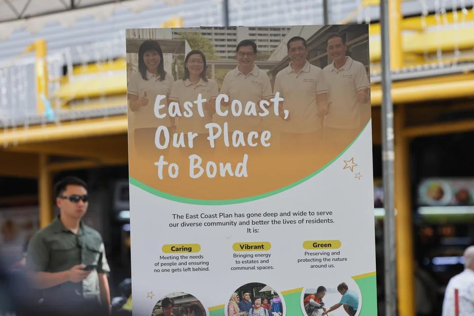 Gambar menunjukkan poster tentang Pelan East Coast dengan gambar pasukan Anggota Parlimen (AP) Parti Tindakan Rakyat (PAP) GRC East Coast yang ada sekarang.