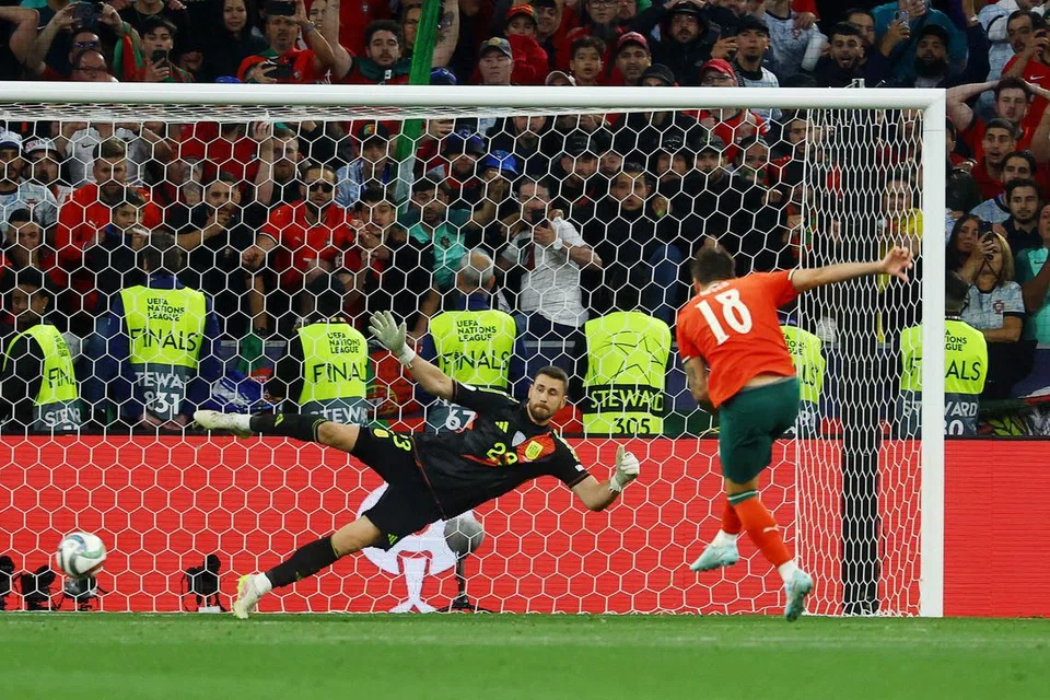Ruben Neves dari Portugal menjaring penalti untuk menang Liga Negara-Negara.