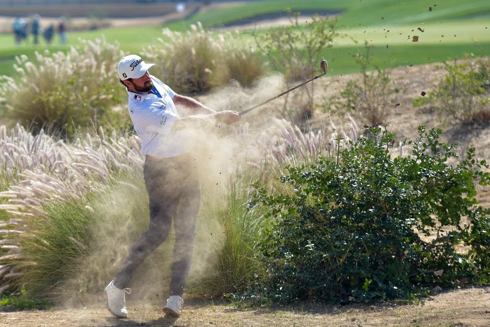 Cameron Young of the United States plays a shot during the PIF Saudi International in King Abdullah Economic City, north of Jeddah. The government is making travel to the country simpler in its bid to attract more tourists. - Photo AFP)