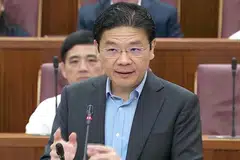 ENCIK WONG: Berbanding dengan rakyat di negara lain, warga Singapura membayar cukai yang lebih rendah. - Foto MCI