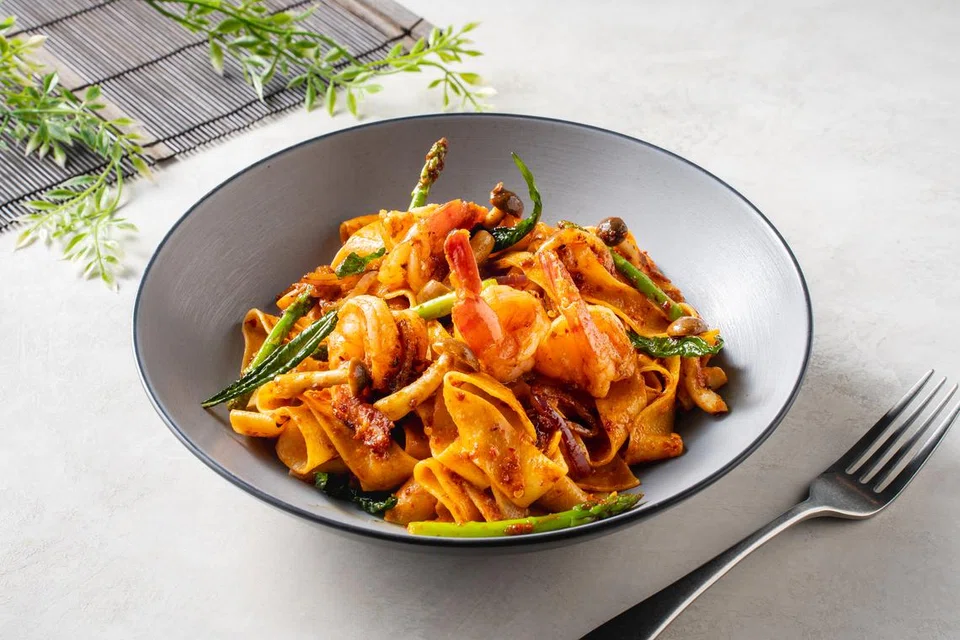 Hidangan ‘fusion’ Melayu, Assam Pedas Pasta ($12.80).