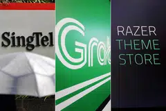 MINAT BUAT PERMOHONAN: Antara syarikat-syarikat yang berminat memohon perbankan digital termasuk Singtel, Grab, Razer dan Validus. - Foto-foto fail