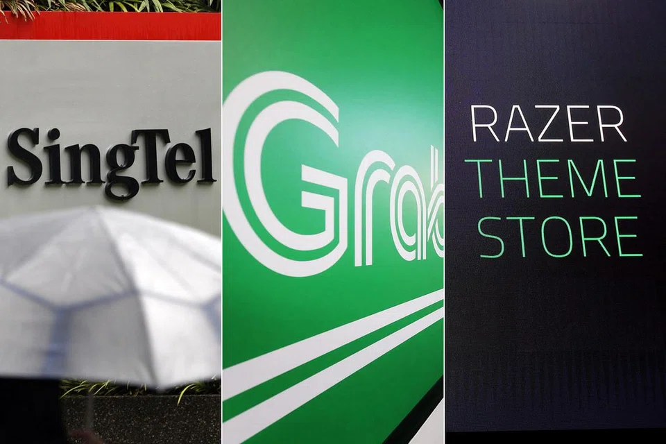 MINAT BUAT PERMOHONAN: Antara syarikat-syarikat yang berminat memohon perbankan digital termasuk Singtel, Grab, Razer dan Validus. - Foto-foto fail