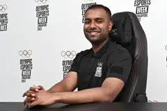 INGIN JADI JUARA: Atlet sukan elektronik Ar Muhammad Aleef Mohamed Rafik mewakili Singapura dalam acara Gran Turismo di Siri e-Sukan Olimpik. 