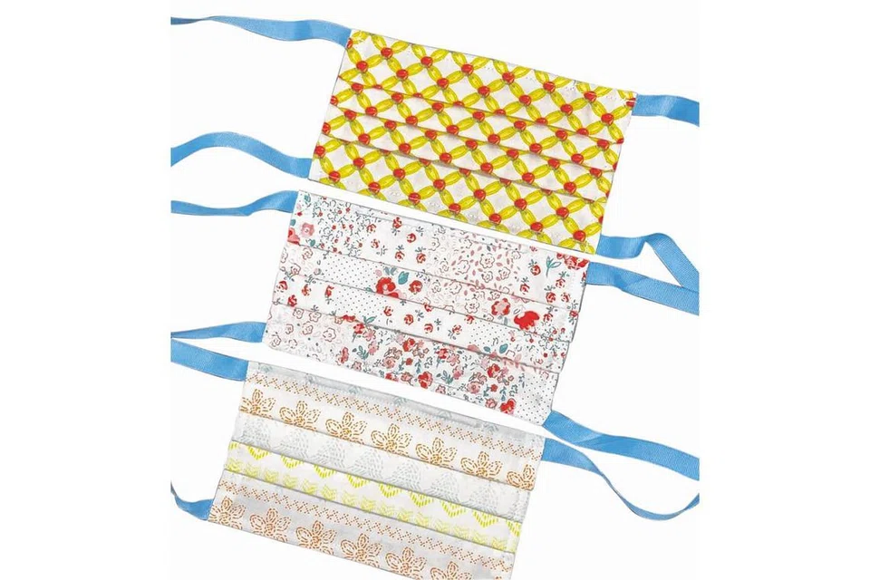 PELBAGAI PILIHAN: Alfya Atelier menjahit pelbagai warna pelitup. - Foto ALFYA ATELIER 