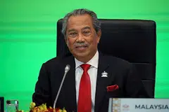 MASA DEPAN JADI TANDA TANYA: Perdana Menteri Malaysia Tan Sri Muhyiddin Yassin ketika berucap di perasmian Mesyuarat Pemimpin Ekonomi Apec pada tahun lalu. - Foto REUTERS