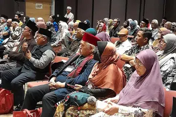 SAMBUTAN MENGGALAKKAN: Sekitar 180 peserta hadir semasa acara PSN20 yang diadakan di Wisma Geylang Serai baru-baru ini. - Foto-foto WISMA GEYLANG SERAI
