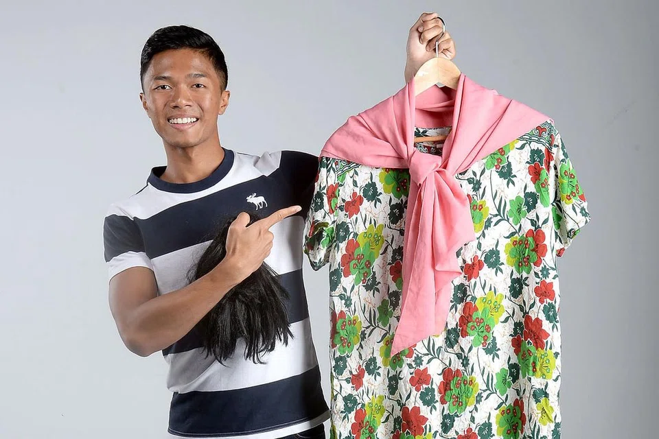 PELBAGAI WATAK DAN GELAGAT: Luqman menyamar sebagai Mak Jah dengan memakai pakaian wanita dan kadangkala rambut palsu dalam video lucunya.