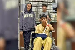 Rita Rudaini (berdiri, kiri) berusaha memberikan yang terbaik buat dua anaknya, Airit Rayyan Rizqin (duduk di kerusi roda), 15 tahun; dan Airit Qaqa Arjuna, 13 tahun, biar apa pun terjadi.