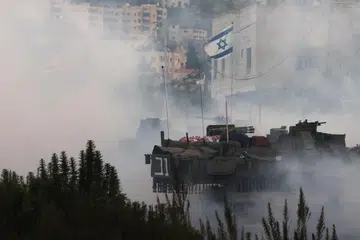 Tentera Israel dengan kereta kebal memasuki kem pelarian Jenin di Tebing Barat pada 23 Februari.